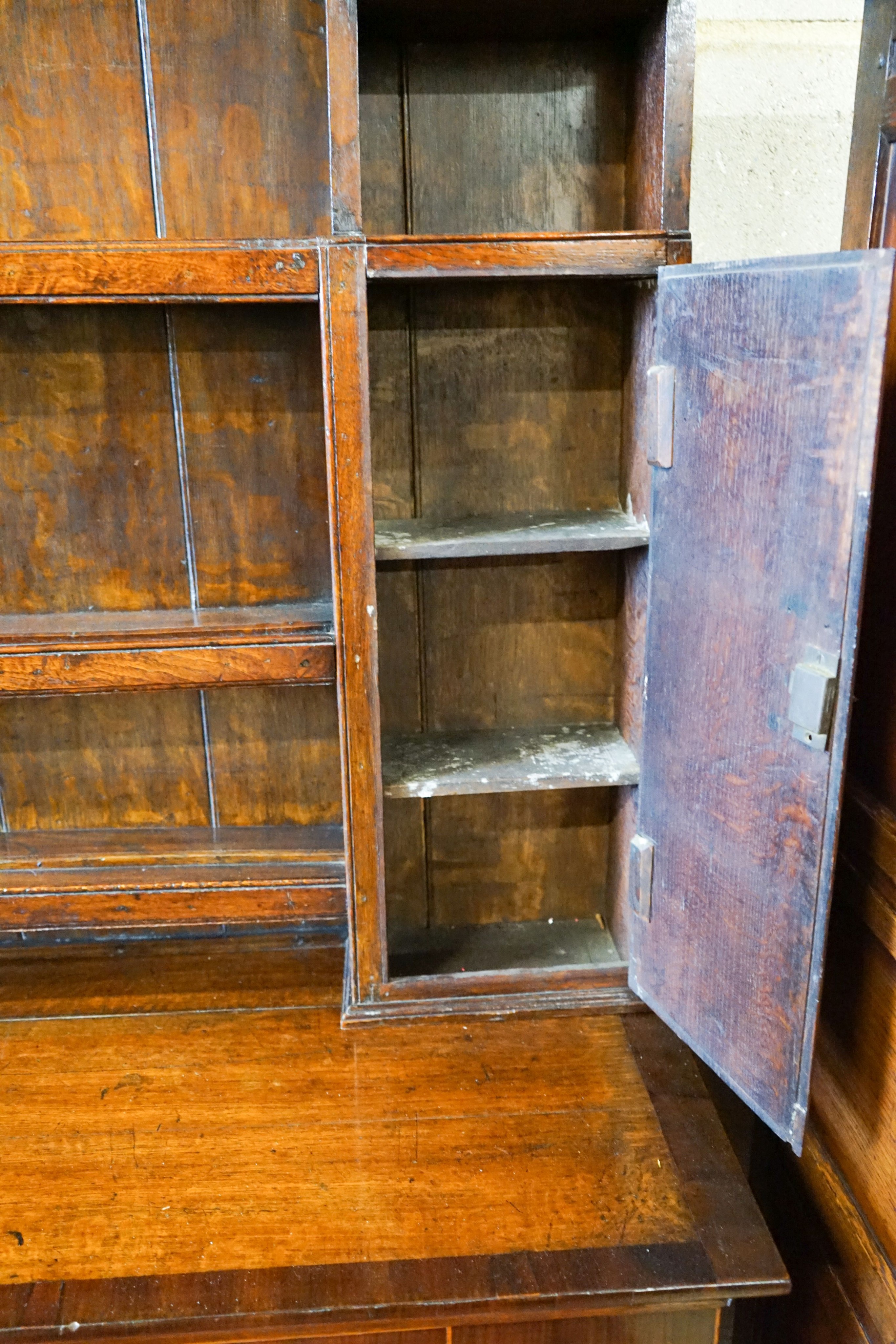 An 18th century oak and mahogany crossbanded dresser